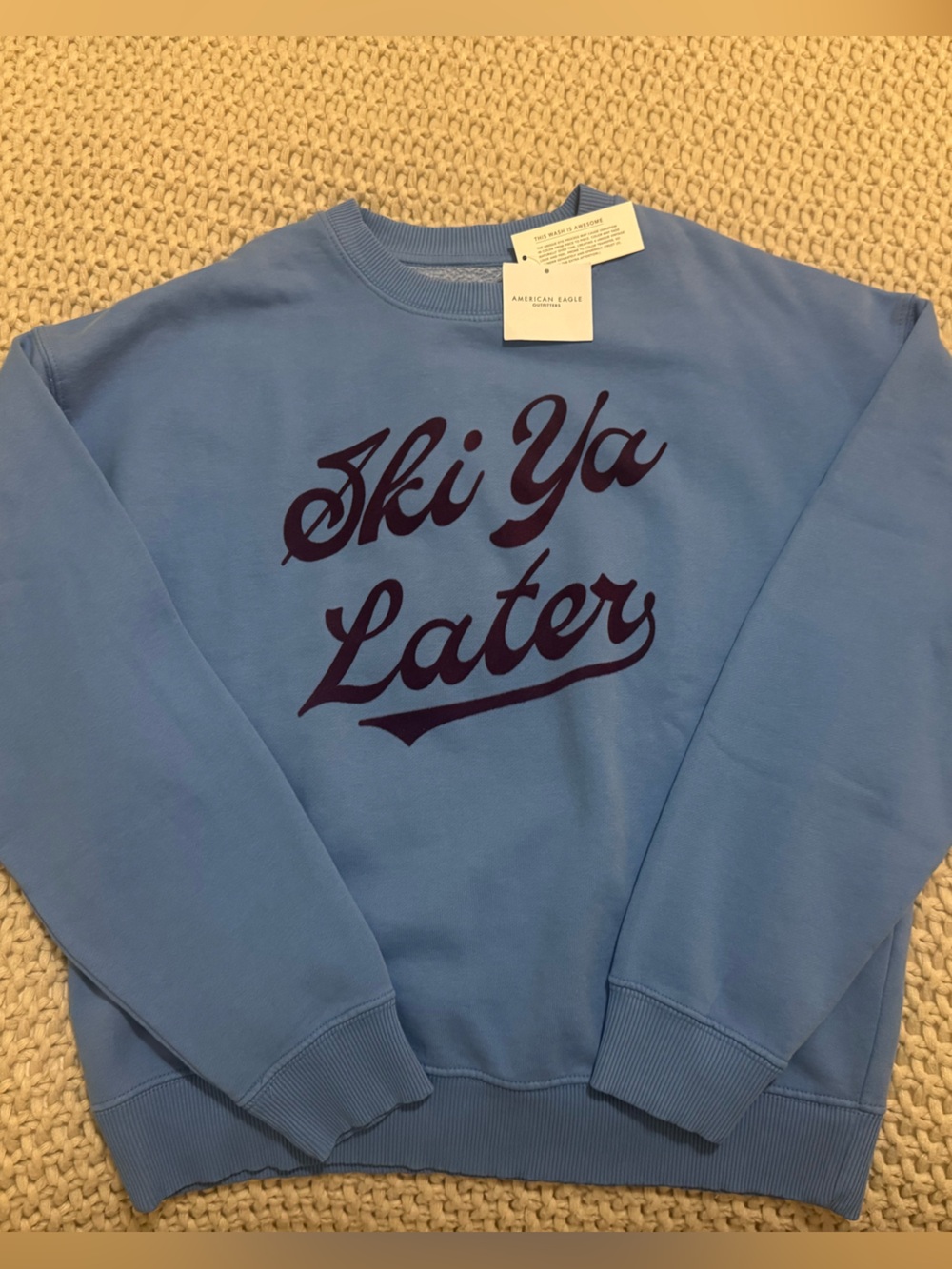 American Eagle Outfitters Light Blue Crewneck with Maroon Script "Ski Ya Later"